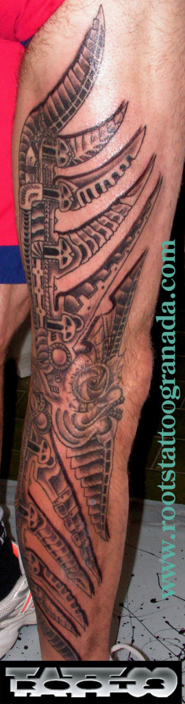 tatuaje águila y pez biomecánico