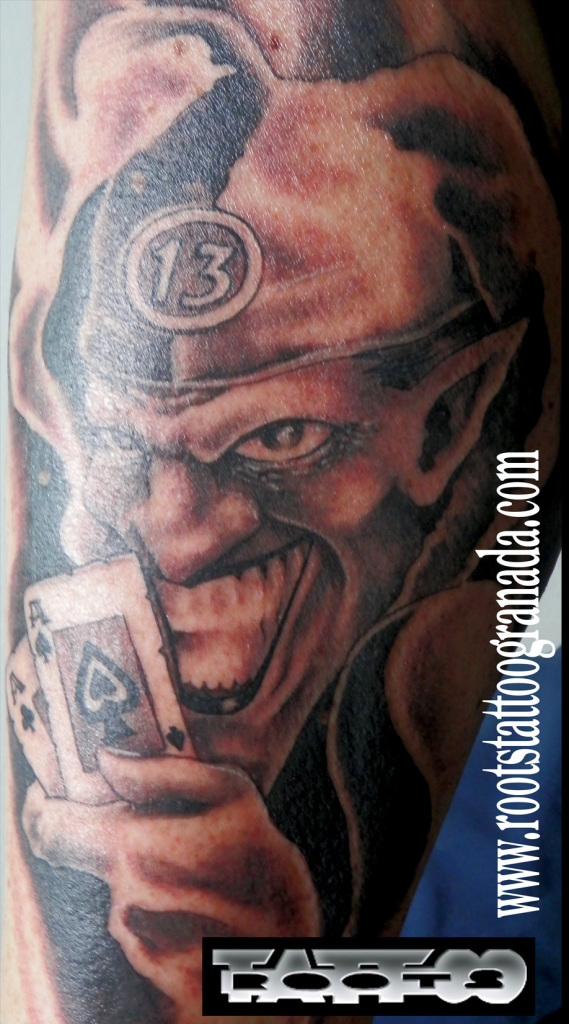 Tatuaje joker cartas