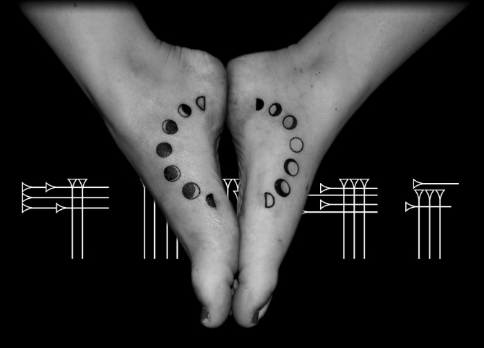 Tattoo moons on feets