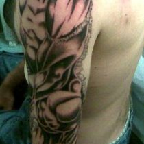 Dragón en brazo hombre