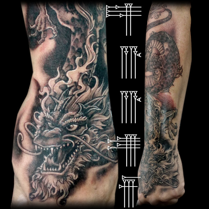 tauaje dragon en el brazo