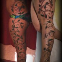 Tatuaje grande con espirales y hadas