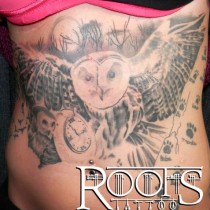 TATUAJE BARRIGA CHICA BUHO
