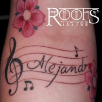 Nota musical con flores y letras