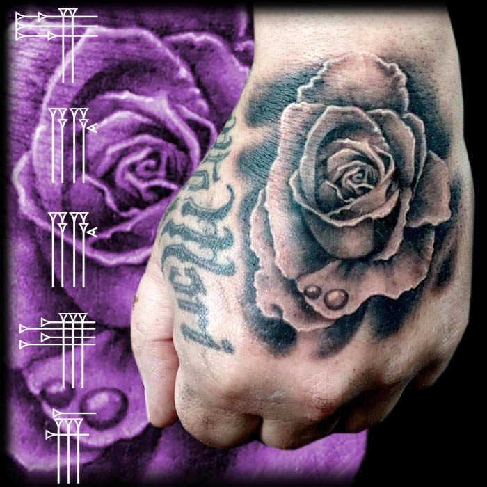 Rose Tattoo in hand