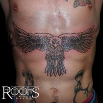 Tatuaje en las abdominales