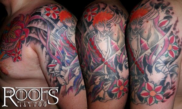 Tatuaje bleach y flor de loto y de cerezo
