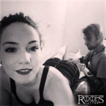 Nice girl having a Tattoo